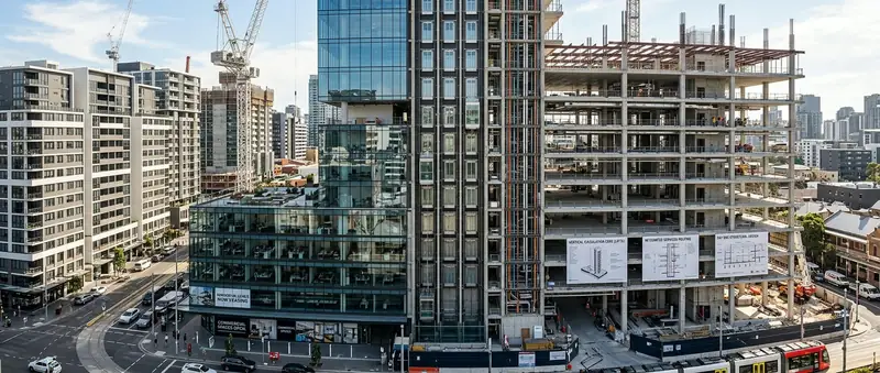 Multi-storey residential block under construction, floor by floor
