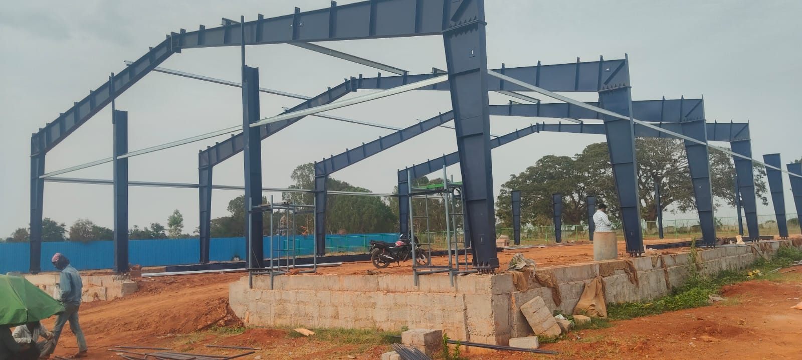Portal frames erected on the plinth beam, bracing run between the bays