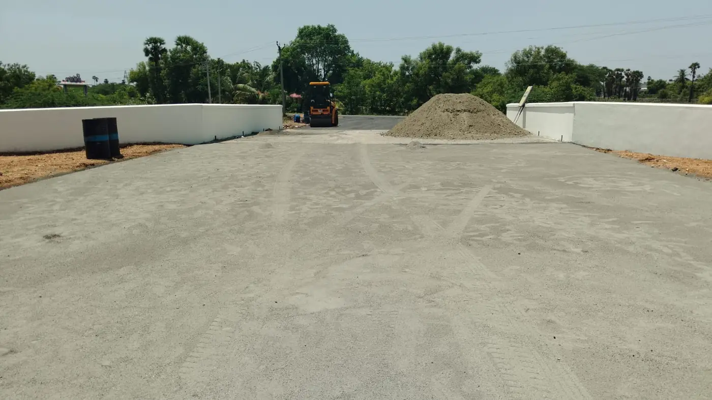 Compacted base course laid across the forecourt between the new compound walls